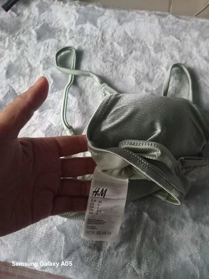 Swimwear top for TAKE ALL (Category: Bikinis & Swimsuits) located in Taguig. Submitted by newwavecollection (Listing ID 1455945662, Image 3). Description: yung green hndi nagamit yung colorful seldom used green and flower print are H&M Brand medium to large.