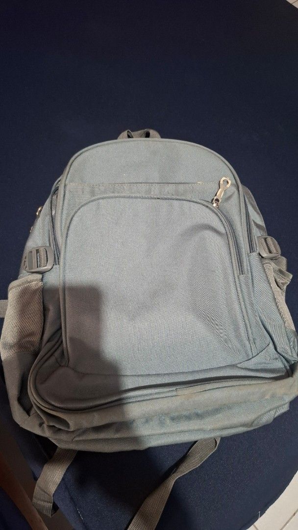Travel Basics Grey Backpack (Category: Backpacks) located in Quezon City. Submitted by pj______ (Listing ID 1455914428, Image 1). Description: No issues, just need cleaning Negotiable for sure buyee.