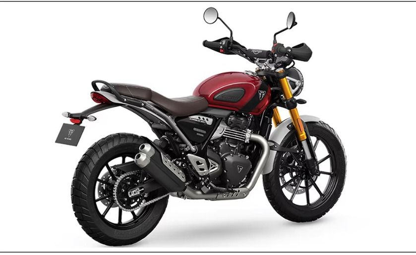Triumph Scrambler Motorcycle - Red and silver (Category: Motorbikes for Sale) located in Makati City. Submitted by annabellsa72715 (Listing ID 1455874726, Image 1). Description: Selling a Triumph Scrambler motorcycle. It's a striking red and silver colorway. Features a comfortable brown seat and rugged tires. Ready for your next adventure. Great for city riding or light trails. Low mileage and well-maintained..