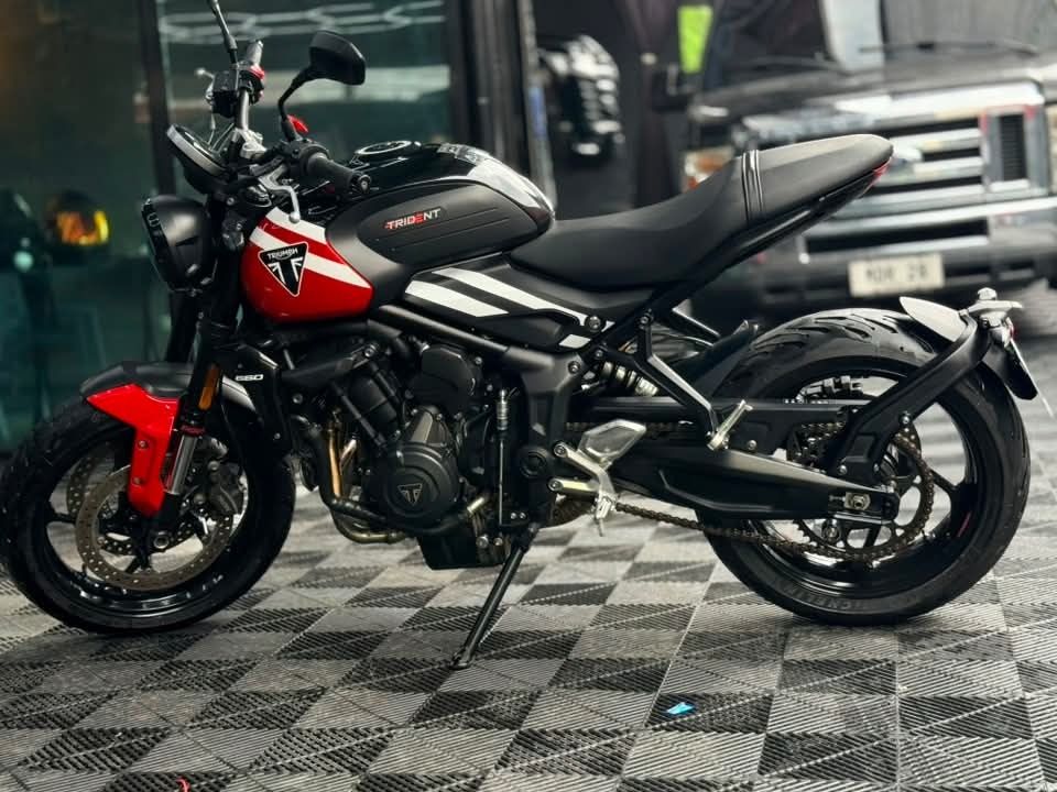 Triumph Trident 660 Motorcycle (Category: Motorbikes for Sale) located in Balagtas. Submitted by jaraiyashin-17020 (Listing ID 1456048158, Image 2). Description: ‼️OPEN FOR TRADE IN‼️ 2025 Triumph trident 660 V2 FREE TRANSFER OF OWNERSHIP (Bought straight to casa) Slip & Assist Clutch Triumph Shift Assist Quickshifter (up/down) 3 Riding Modes: Rain / Road / Sport Cornering ABS + Traction Control Cruise Control Full LED lights • Color TFT display 