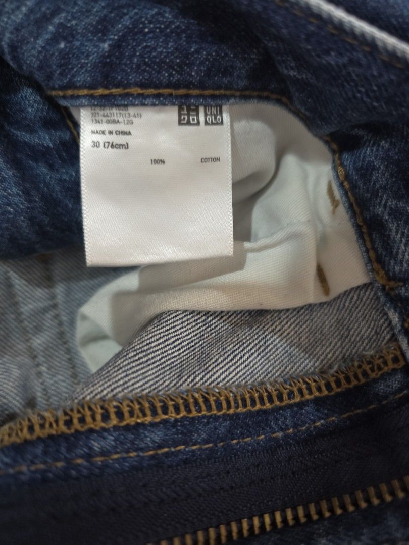Uniqlo Blue Denim Jeans (Category: Jeans) located in Bulacan. Submitted by declutterwithme4 (Listing ID 1455981518, Image 3). Description: - Classic blue denim jeans - Straight leg fit - Button fly closure - Versatile for everyday wear - Easy to style with any top - Waist: 32 inches, Length: 39 inches.