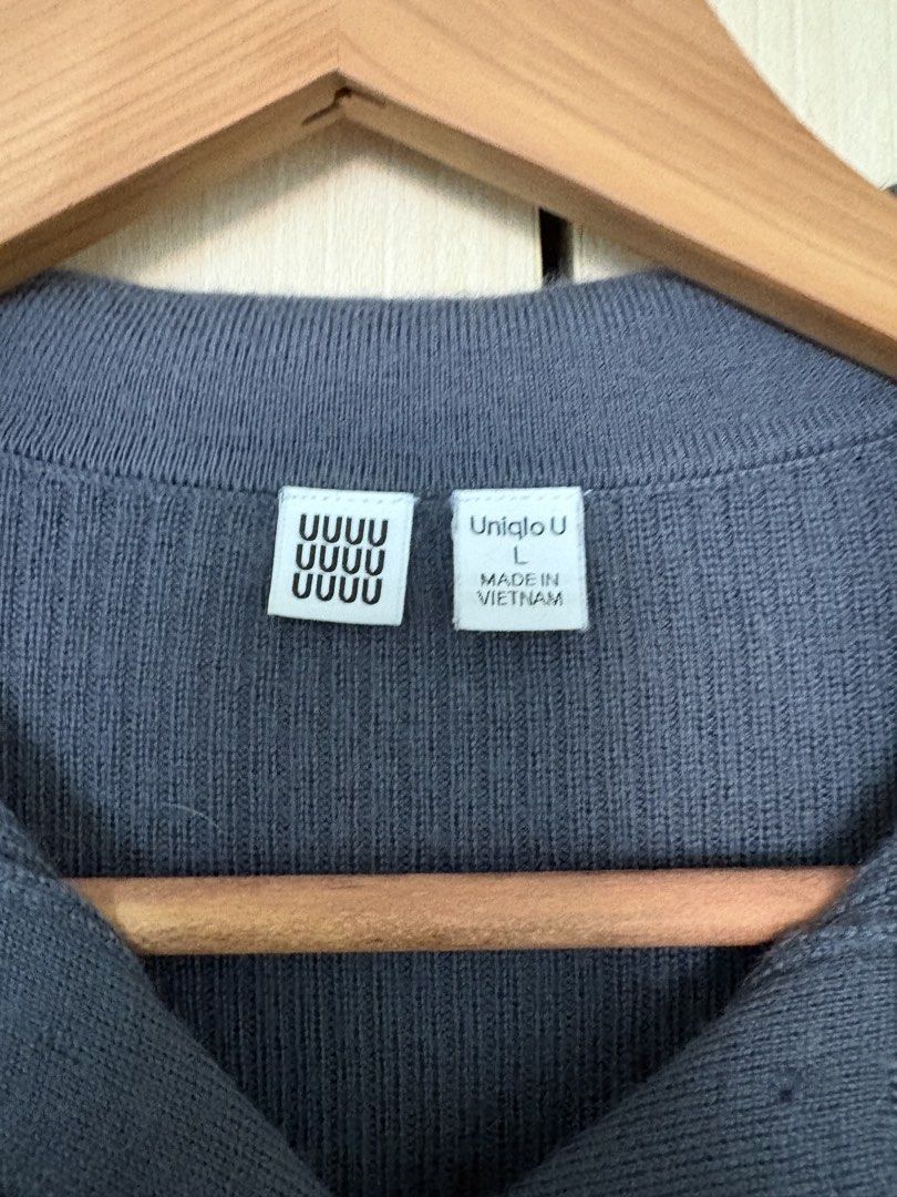 Uniqlo U Ribbed Knit Collared Cardigan (Category: Coats, Jackets and Outerwear) located in Paranaque City. Submitted by chicrepeats (Listing ID 1455885980, Image 3). Description: - Uniqlo U Ribbed Knit Cardigan - Color: Dark Grey/Navy - Features: Long sleeves, collared neckline, button-up front - Style: Versatile for layering or wearing alone - Comfort: Comfortable and easy to wear.