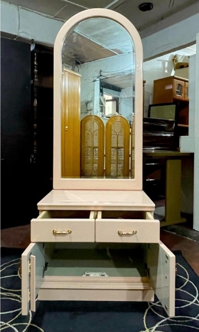 Vanity Table with Large Arched Mirror (Category: Tables & Sets) located in Quezon City. Submitted by dannikkishoppe2 (Listing ID 1455936934, Image 3). Description: Vanity Table with Large Arched Mirror ‼️₱9800‼️ 📏 Dimensions: H-67” × L-23.5” × W-16.5” Please manage your expectations as there might be minimal flaws. Color may vary due to lighting, it may appear darker or lighter in person. Check photos first before buying. Please refrain from pur