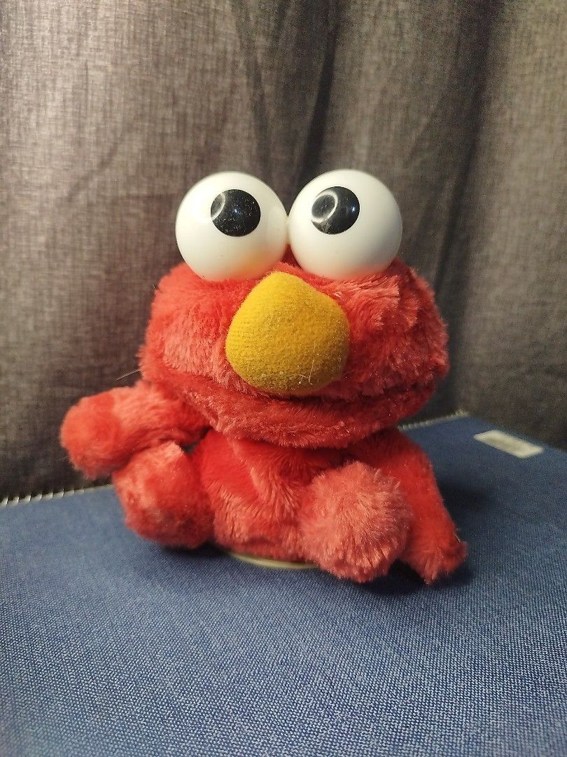 Vintage Elmo from Sesame Street (Category: Plushies & Soft Toys) located in Malolos. Submitted by zenbu_surplus (Listing ID 1456050603, Image 1). Description: Facebook Page: Zenbu Surplus Item Description: Authentic Vintage Elmo Talking Plush Doll Issues: untested, as is Reminder: ~Item color may appear different due to lighting. ~Expect minimal flaws such as stains, scratches, paint chips or signs of usage. ~All of our listed products are Authen