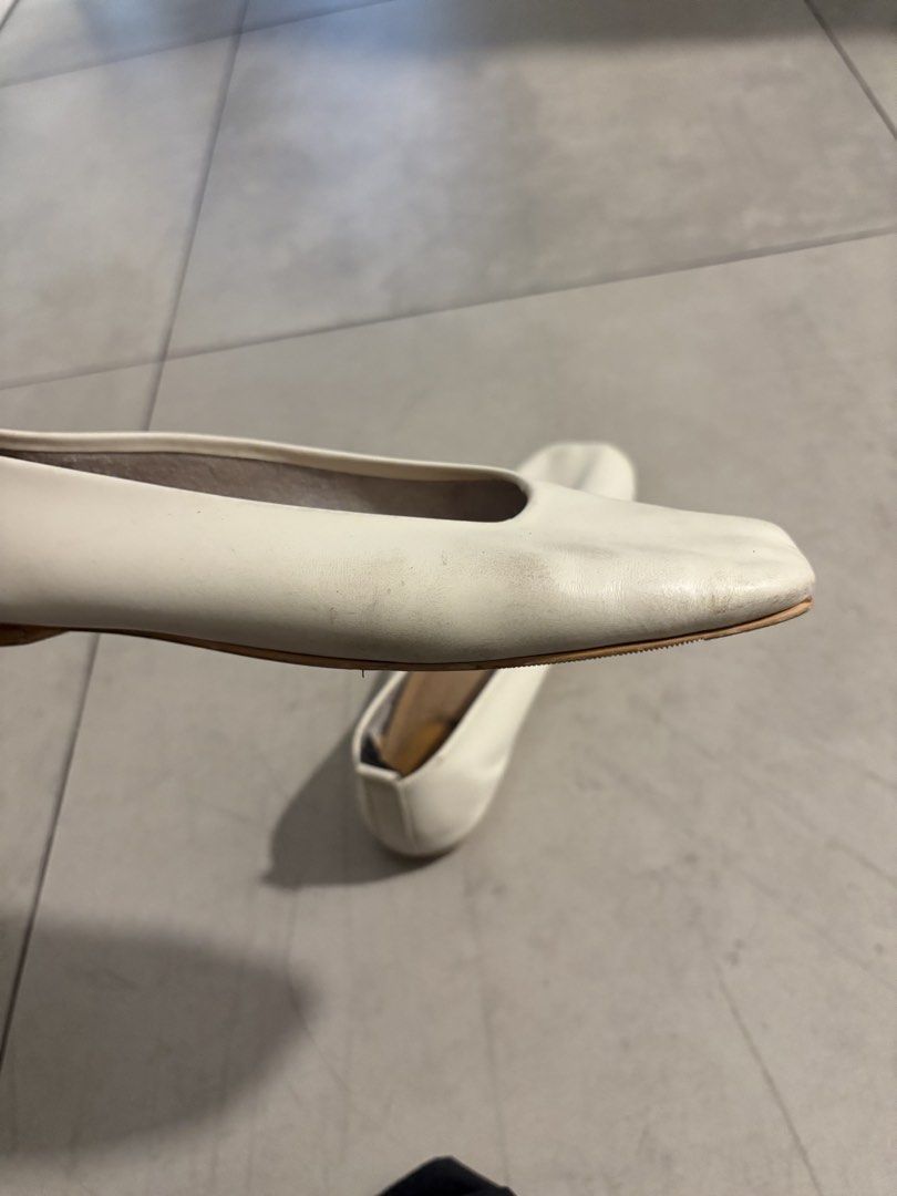 White Leather Ballet Flats size 11 (Category: Flats & Sandals) located in Paranaque City. Submitted by caityprecky (Listing ID 1455969189, Image 3). Description: - White leather ballet flats - Comfortable slip-on style - Minor scuffs on toe area - Slight wear on soles - Plenty of life left - Great for casual wear.