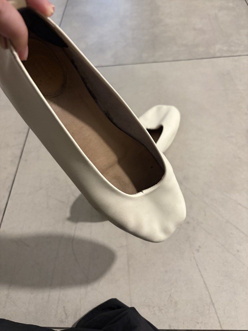 White Leather Ballet Flats size 11 (Category: Flats & Sandals) located in Paranaque City. Submitted by caityprecky (Listing ID 1455969189, Image 2). Description: - White leather ballet flats - Comfortable slip-on style - Minor scuffs on toe area - Slight wear on soles - Plenty of life left - Great for casual wear.