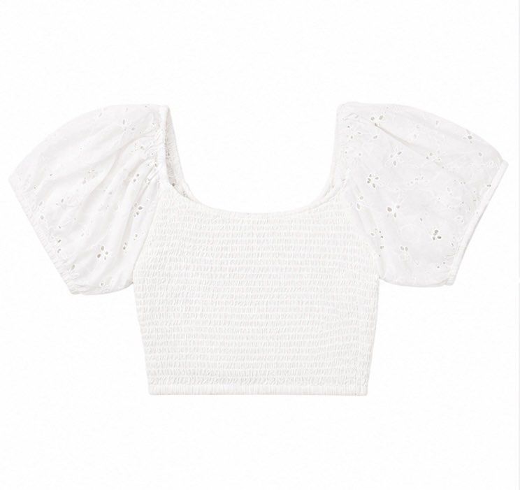 White Smocked Puff Sleeve Eyelet Crop Top (Category: Blouses) located in Las Pinas. Submitted by katb86 (Listing ID 1455924628, Image 3). Description: - White crop top - Smocked front - Puff sleeves with eyelet embroidery - Square neckline - 100% cotton fabric - Care: Warm machine wash, do not bleach or tumble dry, warm iron on reverse (avoiding shirring elastic), do not dryclean..