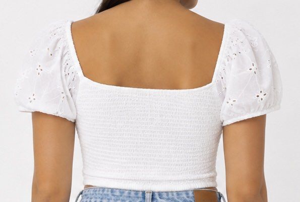 White Smocked Puff Sleeve Eyelet Crop Top (Category: Blouses) located in Las Pinas. Submitted by katb86 (Listing ID 1455924628, Image 2). Description: - White crop top - Smocked front - Puff sleeves with eyelet embroidery - Square neckline - 100% cotton fabric - Care: Warm machine wash, do not bleach or tumble dry, warm iron on reverse (avoiding shirring elastic), do not dryclean..