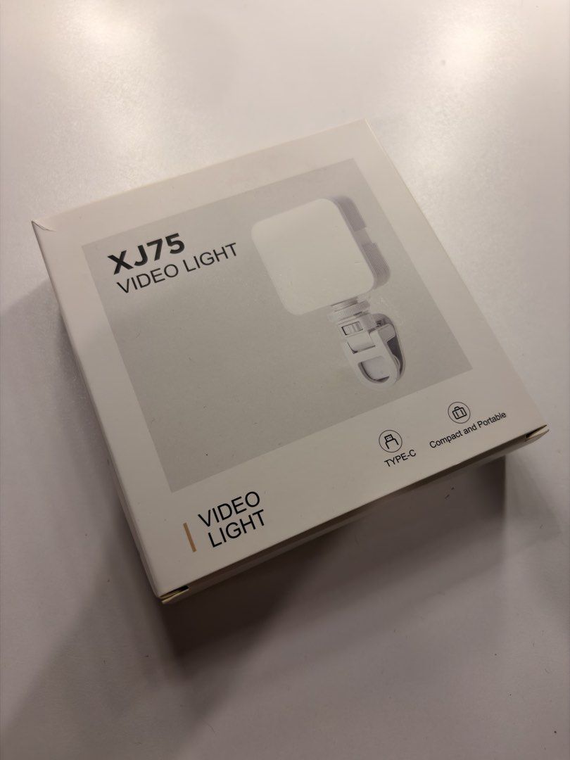 XJ75 Video Tofu Light - Compact and Portable (Category: Lighting & Studio Equipment) located in Cabuyao City. Submitted by benerbo (Listing ID 1455884418, Image 1). Description: - XJ75 Video Light - Ideal for vlogging and content creation - Compact and portable design - Easy to clip onto phones or laptops - Features Type-C charging - Enhances video lighting quality.