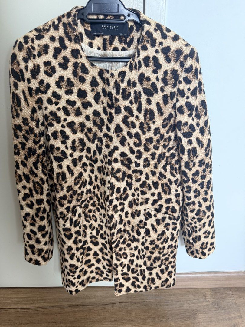 Zara Basic Collection Leopard Print Jacket (Category: Coats, Jackets and Outerwear) located in Kuala Lumpur. Submitted by makeupcloset2025 (Listing ID 1455918108, Image 2). Description: - Zara leopard print jacket - Basic Collection - Collarless design - Two front pockets - Made in Spain - Ideal for layering over tops or dresses - Adds a bold statement to any outfit.