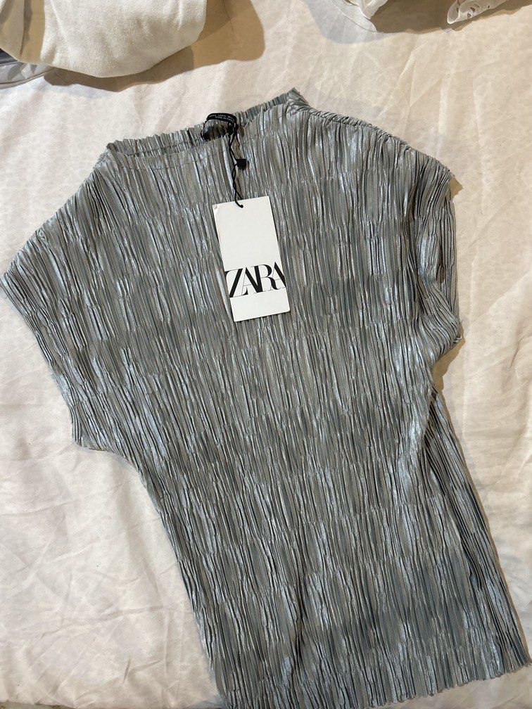 zara shirred silver boat neck top (Category: Others Tops) located in San Pablo. Submitted by mallowclouds (Listing ID 1456008515, Image 1). Description: - brand new with tags 🏷️ zara.