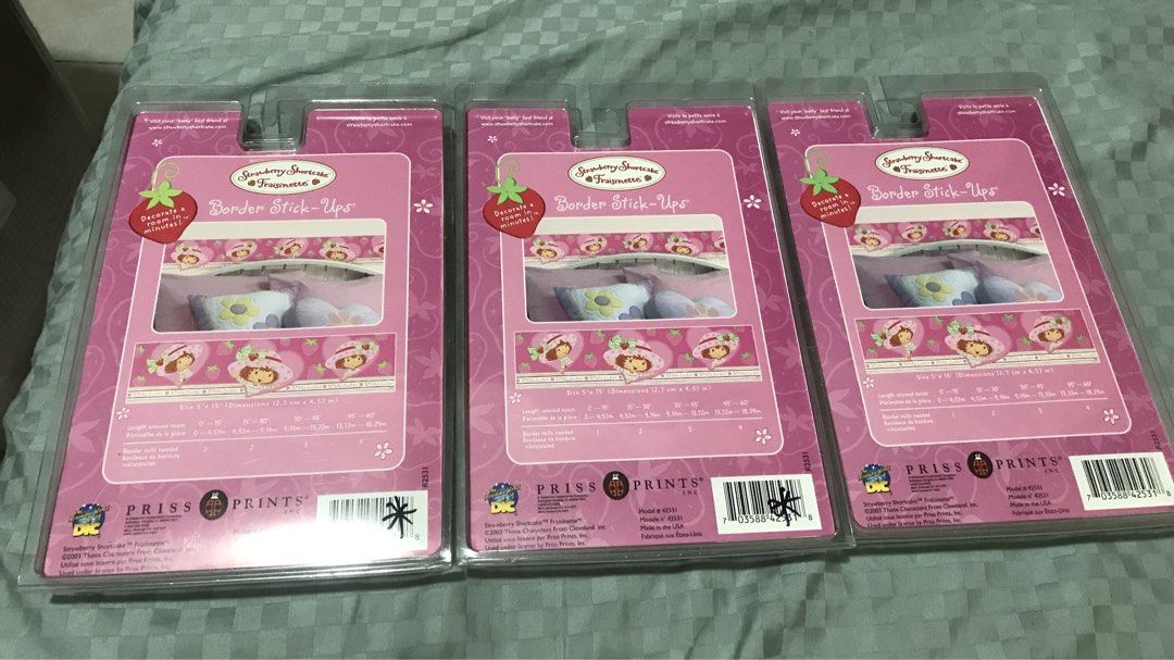 3x Strawberry Shortcake Border Stick-Ups Decor Wall Border (Category: Art & Prints) located in Cavite. Submitted by lizetteag01493 (Listing ID 1455871866, Image 2). Description: - Includes 3 packs of Authentic Strawberry Shortcake Border Stick-Ups. - Each pack measures 5" x 15' (12.7 cm x 4.57 m). - Perfect for decorating a child's bedroom. - Easy to apply. - Officially licensed product from DIC and Priss Prints..