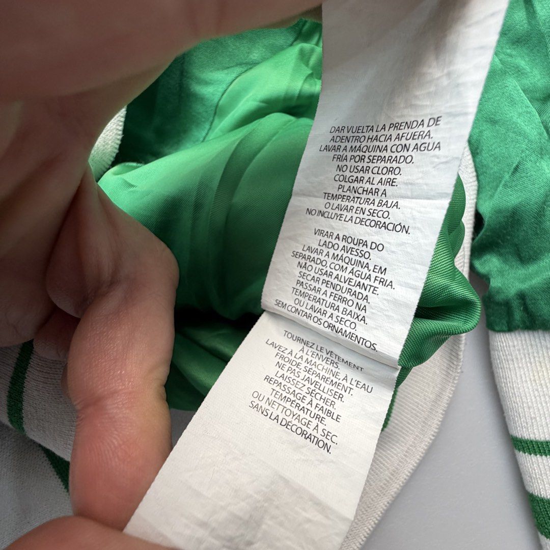 💚 A|X ARMANI EXCHANGE GREEN BOMBER JACKET (Category: Luxury Apparel) located in San Juan City. Submitted by vc828 (Listing ID 1456160047, Image 3). Description: 💚 A|X ARMANI EXCHANGE GREEN BOMBER JACKET Standout Armani Exchange bomber jacket in a vivid emerald green satin finish with contrasting white-and-green striped ribbed trim. Features a full two-way zip front, multiple pockets, branded A|X hardware and a fitted cropped silhouette. • A|X A