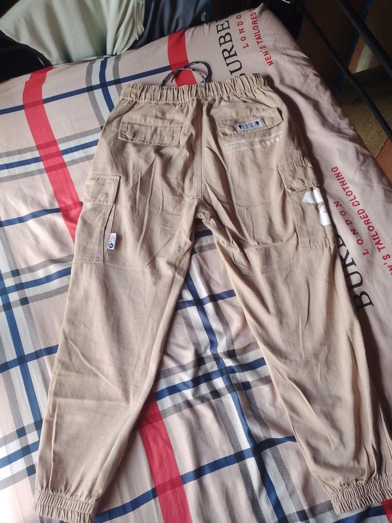 AAPE JOGGER KHAKI (Category: Joggers) located in Bulacan. Submitted by side.hustle11 (Listing ID 1456058877, Image 2). Description: AAPE JOGGER PANTS KHAKI WAISTLINE 28-32 LENGTH 38 EXCELLENT CONDITION PRICE 700 LOC BULACAN.
