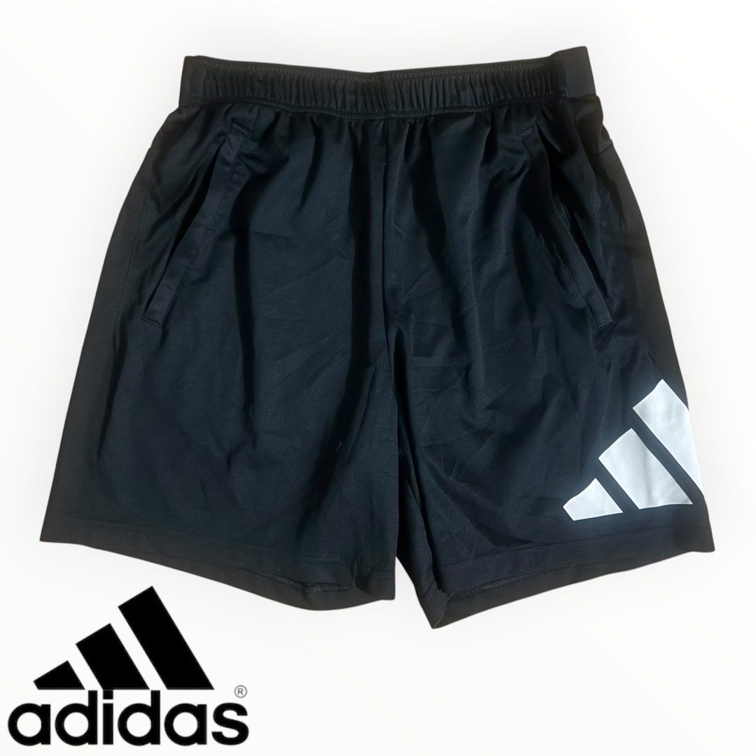 Adidas Black Shorts with White Logo (Category: Activewear) located in Manila. Submitted by johnnypapa0530 (Listing ID 1456224200, Image 1). Description: Brand: adidas w/ 2 zipper pocket (big logo) Tag size: large but pede medium W: 29-34 L: 17.5 Condition: 9/10 (excellent-new) Price: 450.