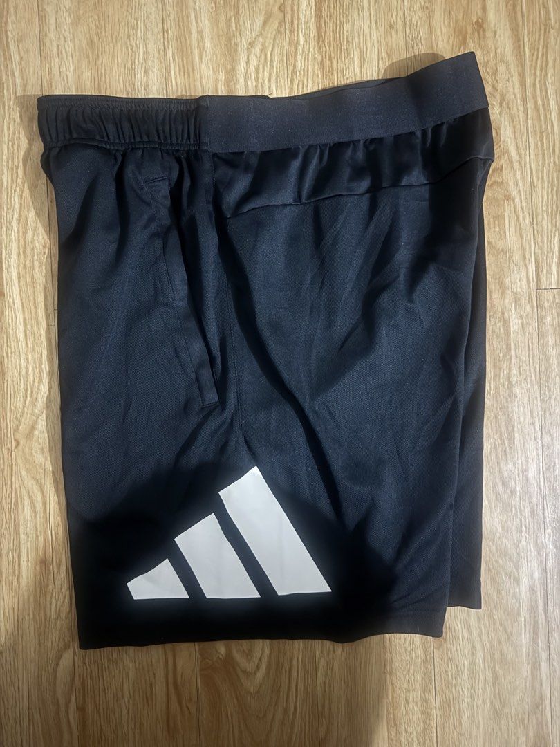 Adidas Black Shorts with White Logo (Category: Activewear) located in Manila. Submitted by johnnypapa0530 (Listing ID 1456224200, Image 3). Description: Brand: adidas w/ 2 zipper pocket (big logo) Tag size: large but pede medium W: 29-34 L: 17.5 Condition: 9/10 (excellent-new) Price: 450.