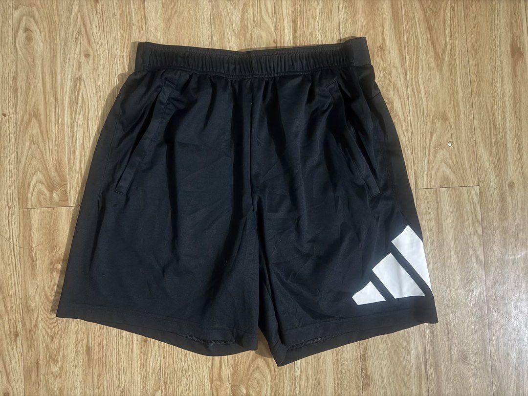 Adidas Black Shorts with White Logo (Category: Activewear) located in Manila. Submitted by johnnypapa0530 (Listing ID 1456224200, Image 2). Description: Brand: adidas w/ 2 zipper pocket (big logo) Tag size: large but pede medium W: 29-34 L: 17.5 Condition: 9/10 (excellent-new) Price: 450.