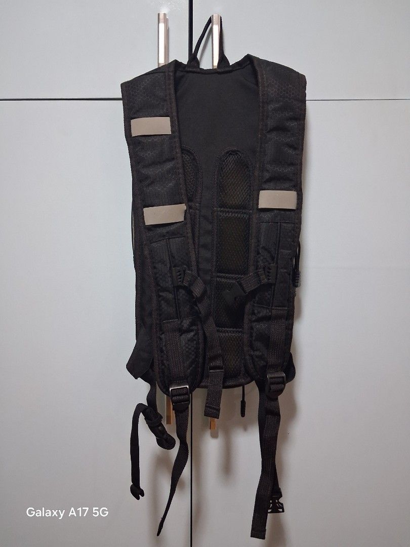 Alpinestars Black Hydration Pack Backpack (Category: Backpacks) located in Imus. Submitted by jefflac54673 (Listing ID 1456067821, Image 3). Description: - Alpinestars hydration pack in sleek black. - Features multiple zippered compartments for secure storage. - Adjustable straps ensure a comfortable, customized fit. - Enhanced visibility with reflective strips on the back. - Ideal for motorcycle rides, cycling, hiking, and other outdoor adventur
