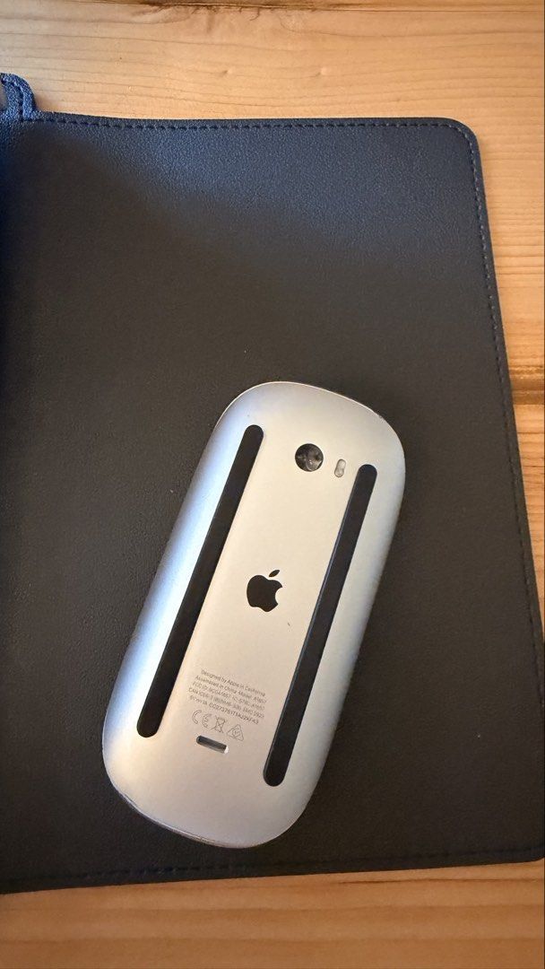 Apple Magic Mouse (Category: Mouse & Mousepads) located in Lucena. Submitted by dianneco (Listing ID 1456076642, Image 2). Description: Apple Magic Mouse -Charge via lightning cable - Excellent working condition - Features smooth scrolling and intuitive multi-touch gestures - Wireless connectivity via Bluetooth - Classic silver and white design - Minor cosmetic scuffs on the bottom from normal use - Original box not included RFS: extra.