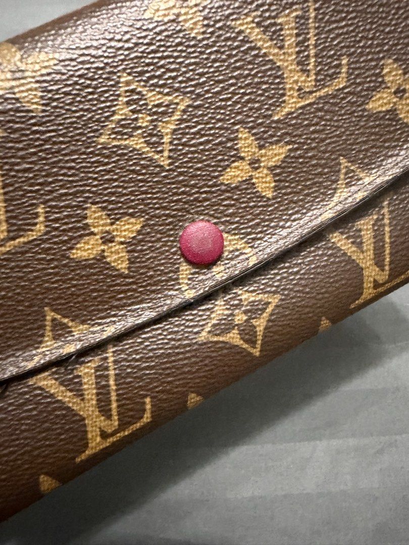 Authentic LV Louis Vuitton Monogram Emilie Long Wallet w receipt (Category: Luxury Bags & Wallets) located in Taytay. Submitted by mipreluxe2 (Listing ID 1456079478, Image 3). Description: Authentic LV Louis Vuitton Monogram Emilie Long Wallet - Fuchsia Comes with receipt In great condition Guaranteed authentic 💯 10x Moneyback if proven fake Normal signs of usage, refer to the photos Message me if you want additional photos. No inclusions BDO, G