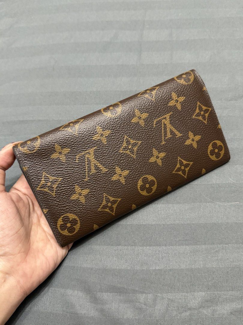 Authentic LV Louis Vuitton Monogram Emilie Long Wallet w receipt (Category: Luxury Bags & Wallets) located in Taytay. Submitted by mipreluxe2 (Listing ID 1456079478, Image 2). Description: Authentic LV Louis Vuitton Monogram Emilie Long Wallet - Fuchsia Comes with receipt In great condition Guaranteed authentic 💯 10x Moneyback if proven fake Normal signs of usage, refer to the photos Message me if you want additional photos. No inclusions BDO, G