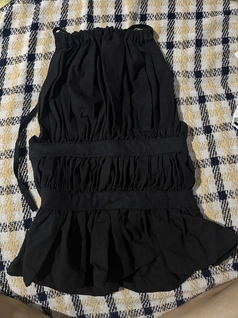 Black Ruched Halter Neck Peplum Top (Category: Sleeveless) located in Botolan. Submitted by arrietafrancinealexis (Listing ID 1456107634, Image 3). Description: - Black halter neck top - Ruched detailing - Cinched waist - Peplum hem - Ties at the back of the neck - Versatile for night out or casual wear - Easy to pair with jeans or skirts - Comfortable fabric.
