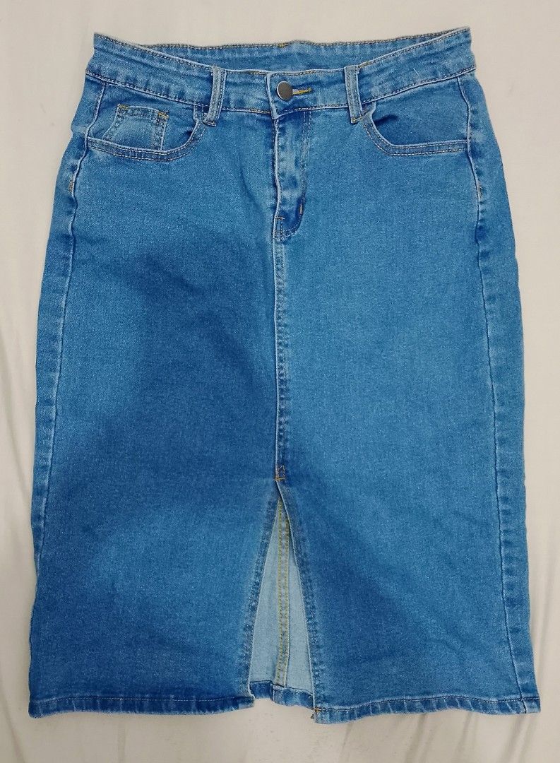 Blue Denim Midi Skirt with Front Slit (Category: Skirts) located in Marikina City. Submitted by maitwosquared (Listing ID 1456132733, Image 2). Description: - Classic blue denim midi skirt - High waist design - Front slit for easy movement - Two front pockets and one back pocket - Versatile for pairing with various tops - Ideal for casual outings.