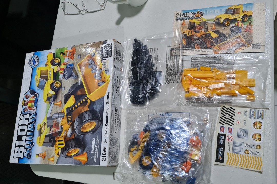 Bnew Mega Bloks Blok Squad Construction Mission lego (Category: Lego & Building Sets) located in Quezon City. Submitted by shaneshadow (Listing ID 1456171805, Image 3). Description: Bought from Toys R Us for gifting pero nakalimutan sa storage. Selling it brandnew. Condition: Unopened set of plastics. Opened for picture purposes - Mega Bloks Blok Squad Construction Mission set - 218 pieces included - Build a front loader and a truck - Comes with 