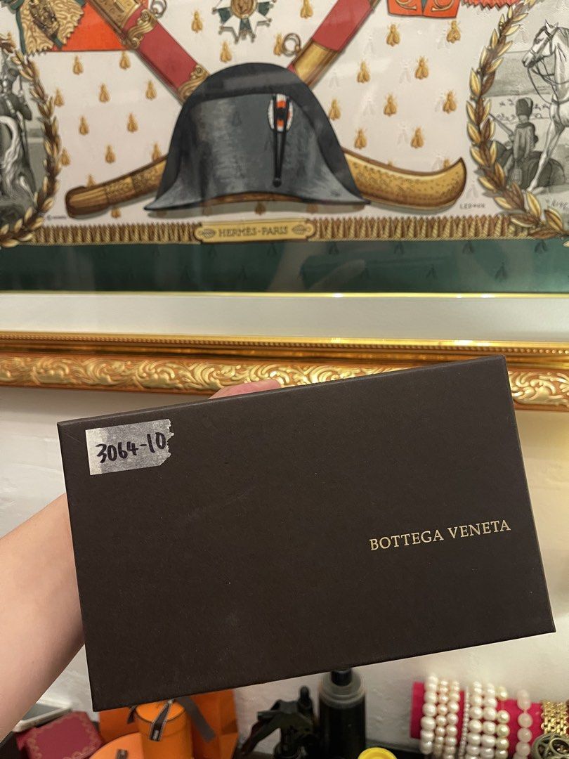 Bottega Veneta Box (Category: Luxury Bags & Wallets) located in Marilao. Submitted by wardrovearchives (Listing ID 1456215962, Image 1). Description: - Original Bottega Veneta box - Color: Dark brown with gold lettering - Features a sticker with '3064-10' - Ideal for storing small items or as a collector's piece.