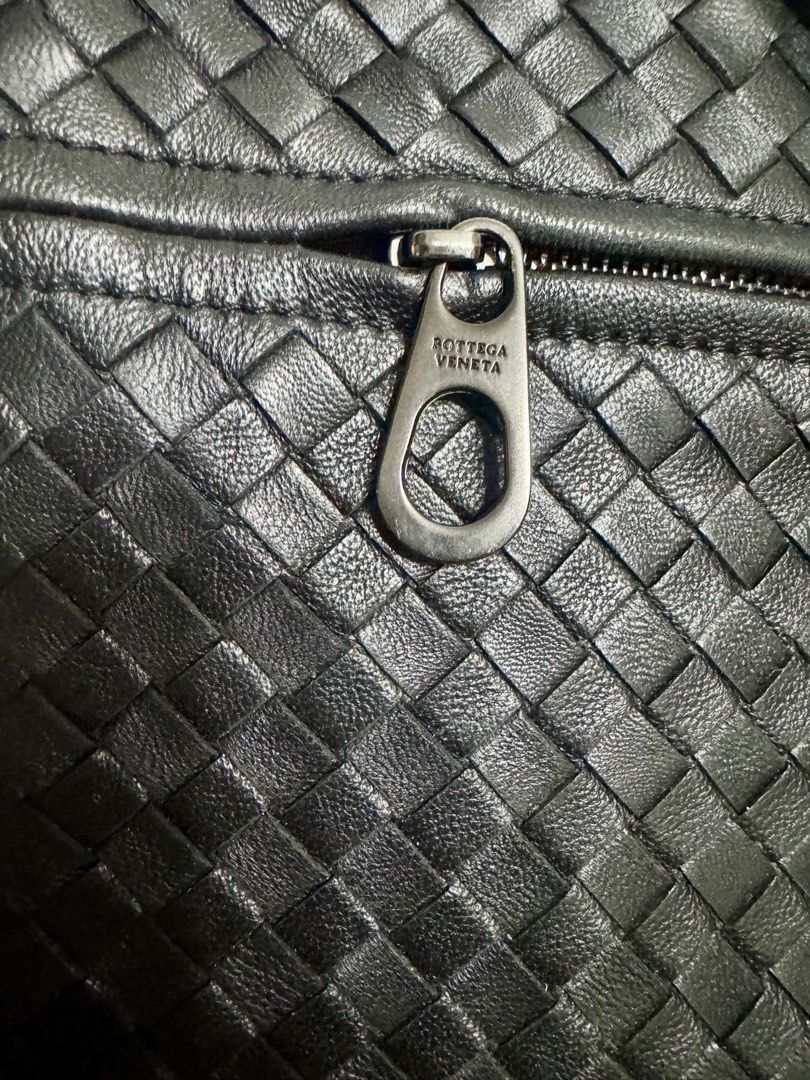 Bottega Veneta Intrecciato Briefcase (Category: Laptop Bags & Sleeves) located in Malolos. Submitted by urban_thrift_09 (Listing ID 1456204190, Image 3). Description: -woven leather body -rolled leather handles -top zip closure -exterior front zip pocket -interior slip pockets -black leather Size: 16”x11”2.5”.