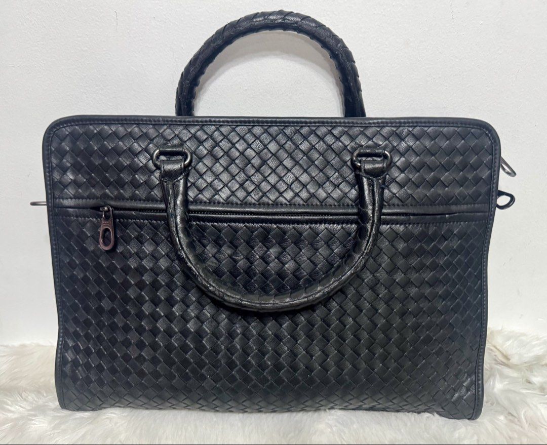 Bottega Veneta Intrecciato Briefcase (Category: Laptop Bags & Sleeves) located in Malolos. Submitted by urban_thrift_09 (Listing ID 1456204190, Image 1). Description: -woven leather body -rolled leather handles -top zip closure -exterior front zip pocket -interior slip pockets -black leather Size: 16”x11”2.5”.