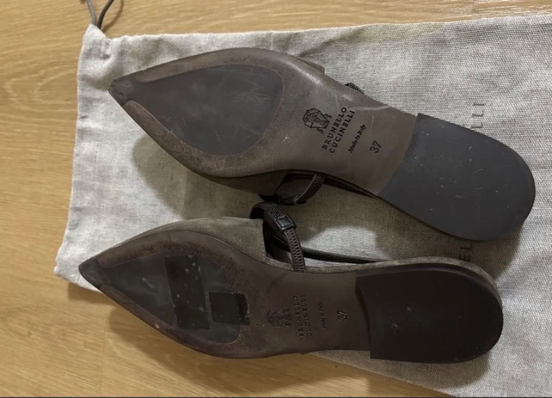 AUTHENTIC Brunello Cucinelli Suede Slingback Flats with Embellished Strap (Category: Sneakers & Footwear) located in Makati City. Submitted by cht1992 (Listing ID 1456185533, Image 3). Description: - Brand: Brunello Cucinelli - Color: Grey - Material: Suede - Style: Slingback Flats - Toe: Pointed - Details: Delicate embellished strap across vamp, elasticated slingback strap - Origin: Made in Italy - Includes: Original dust bag - 100% authentic - 