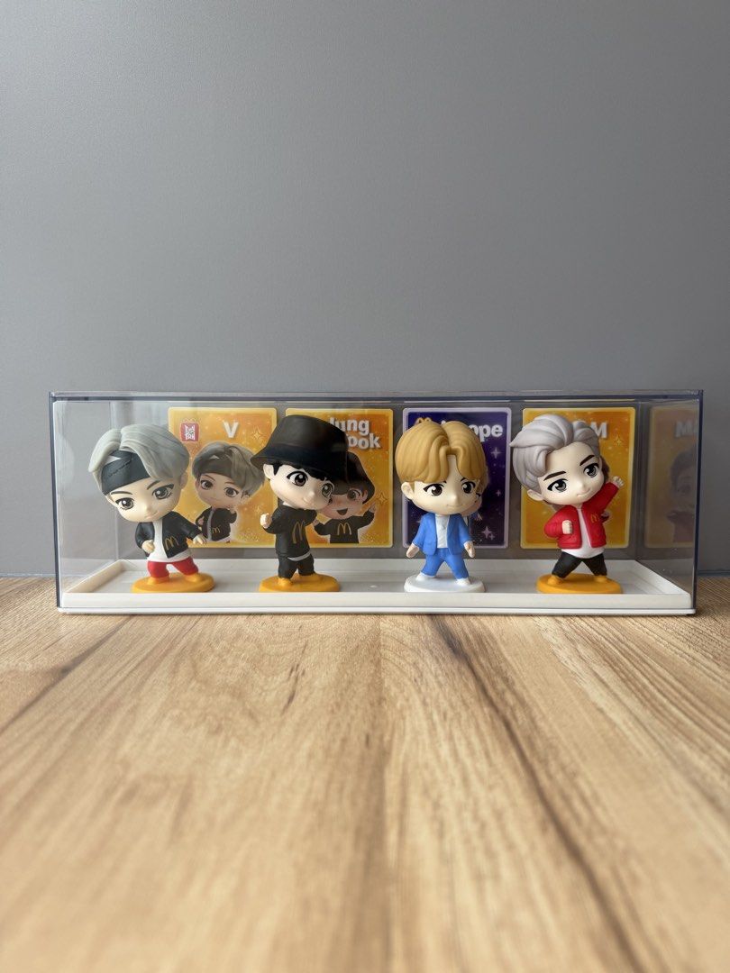 BTS McDonald's Collection Figurines Display Case (Category: Figurines & Statues) located in Pasay City. Submitted by wontonwonie (Listing ID 1456129300, Image 2). Description: - Set of 4 BTS McDonald's collaboration figurines - Features members in iconic outfits - Includes a clear display case - Super cute and detailed design - A must-have for any BTS fan's collection!.