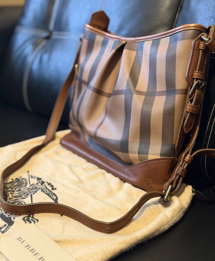 Burberry Hartham Leather Shoulder Bag (Category: Luxury Bags & Wallets) located in Muntinlupa City. Submitted by j_aseneta (Listing ID 1456159203, Image 3). Description: - Authentic Burberry shoulder bag - Classic nova check pattern - Brown leather trim - Interior compartments for organization - Comes with original dust bag - Includes authenticity cards - A timeless addition to your collection - Bought at LAX Airport (Php 28k) - Selling for Php 1