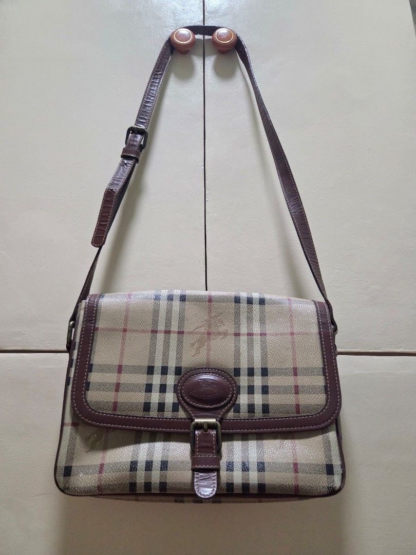 Burberry Nova Check Crossbody Bag (Category: Luxury Bags & Wallets) located in Taguig. Submitted by kincathlyn (Listing ID 1456171931, Image 1). Description: - Classic Burberry crossbody bag - Iconic Nova Check pattern with leather trim - Adjustable strap with buckle closure - Secure buckle and tab closure on the front flap - Ideal for everyday use Price still nego. PM! .