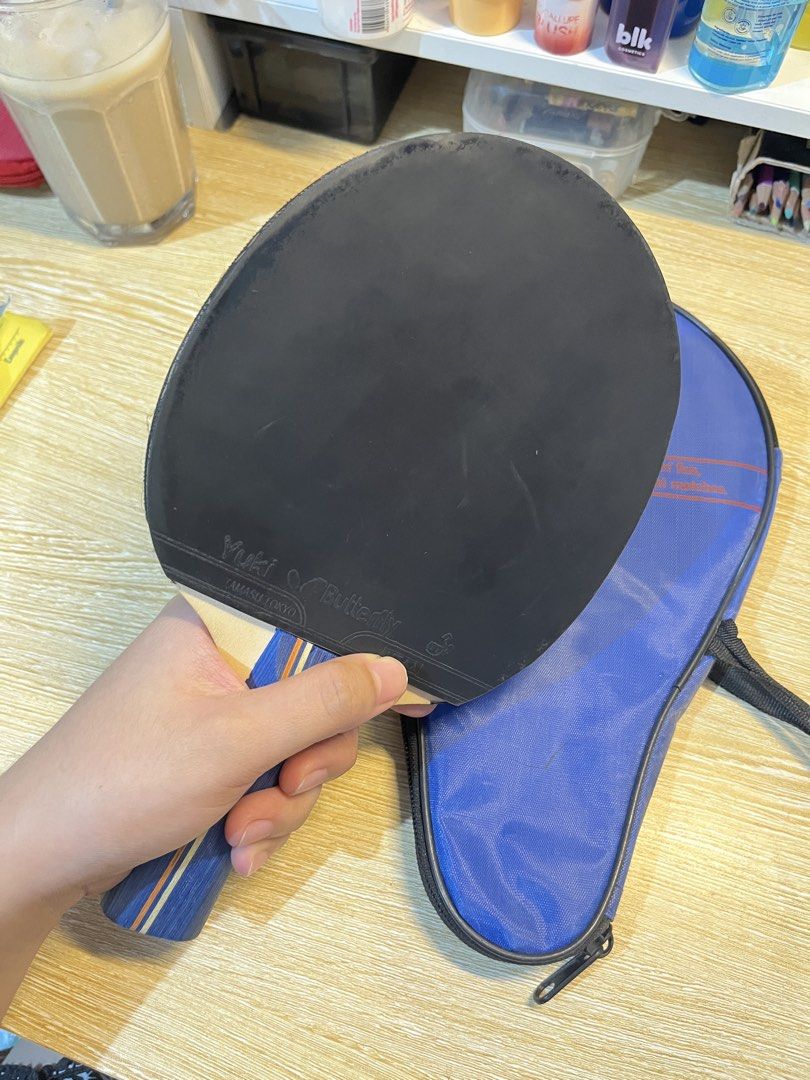Butterfly Table Tennis Racket with extra racket (Category: Other Sports Equipment and Supplies) located in Malolos. Submitted by iyowa7323 (Listing ID 1456138966, Image 3). Description: -Used it mainly for our PE and sometimes practice plays -Perfect For Beginner Level Ping Pong Players -Sh*pee bought for 544 -Includes the racket, extra racket (champion), and the bag will include pingpong balls ‘pag nahanap ko. -yung extra racket is nakatambak la