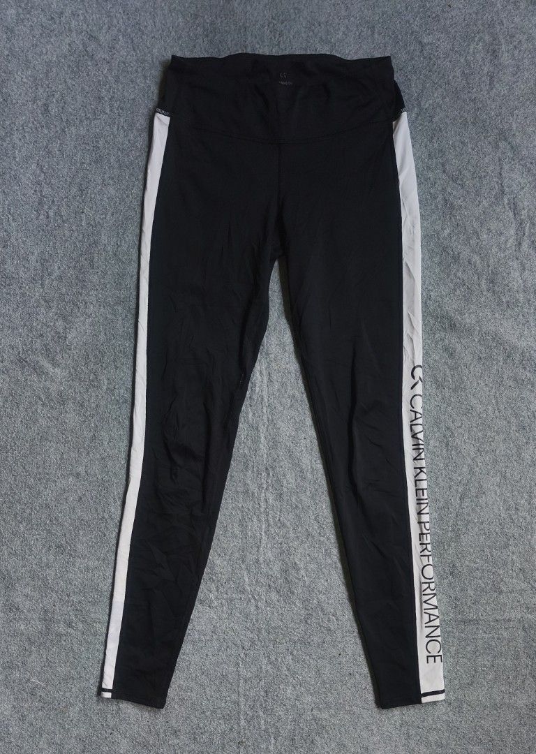 Calvin Klein Performance Black Leggings with White Stripe (Category: Activewear) located in Cagayan de Oro. Submitted by elijah350below (Listing ID 1456175820, Image 1). Description: - Black Calvin Klein Performance leggings - White stripe with "CALVIN KLEIN PERFORMANCE" text down the side - Comfortable for workouts or casual wear - Size: Small payment: Gcash, paymaya, maribank & LBP courier: J&T color may vary due to lightning items are thrifted