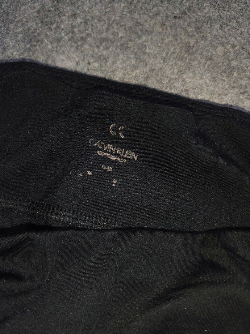 Calvin Klein Performance Black Leggings with White Stripe (Category: Activewear) located in Cagayan de Oro. Submitted by elijah350below (Listing ID 1456175820, Image 3). Description: - Black Calvin Klein Performance leggings - White stripe with "CALVIN KLEIN PERFORMANCE" text down the side - Comfortable for workouts or casual wear - Size: Small payment: Gcash, paymaya, maribank & LBP courier: J&T color may vary due to lightning items are thrifted