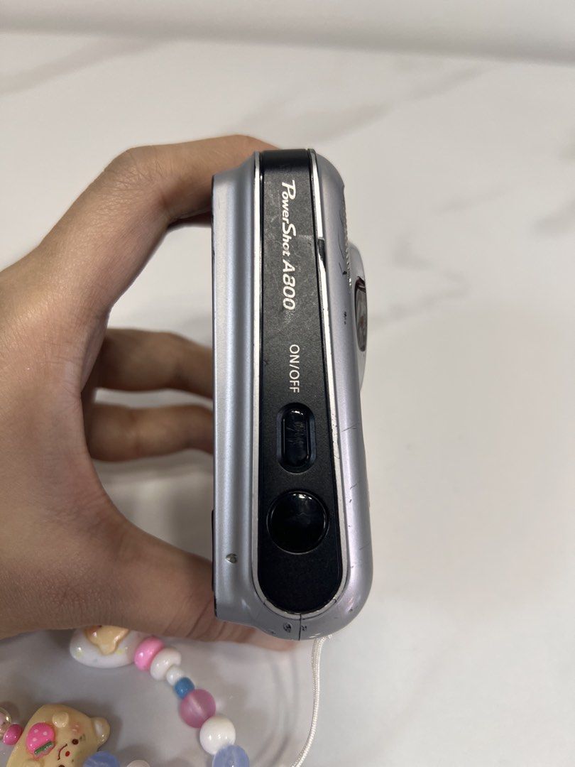 Canon PowerShot A800 (Category: Cameras) located in Davao. Submitted by beniceandrea (Listing ID 1456179158, Image 3). Description: Canon PowerShot A800 10.0 megapixels 3.3x optical zoom Cosmetics: 7/10 with minor scuffs on the body (doesn’t affect output) So tiny. Fits in your pocket perfectly 😍 Includes a beaded wrist strap and 2 AA batteries PM for sample photos. Location: Davao City .