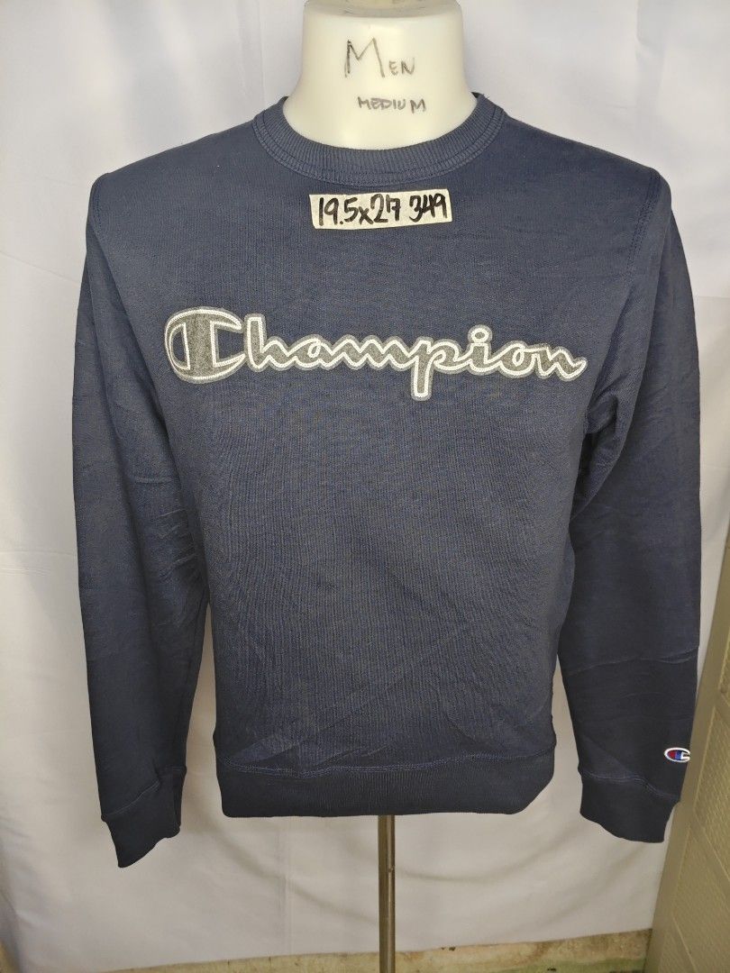Champion Patch Script (Category: Coats, Jackets and Outerwear) located in Rizal. Submitted by itsmecle0 (Listing ID 1456130282, Image 1). Description: Size:M Width:19.5 inches tape measurement Length:27 inches tape measurement Color:Navy Blue Color rate: 9.7 Condition Rate:9.7 Issue:None Other details: Solid heavyweight cotton fabric crisp Embroidered patch logo champion 🔥🔥.