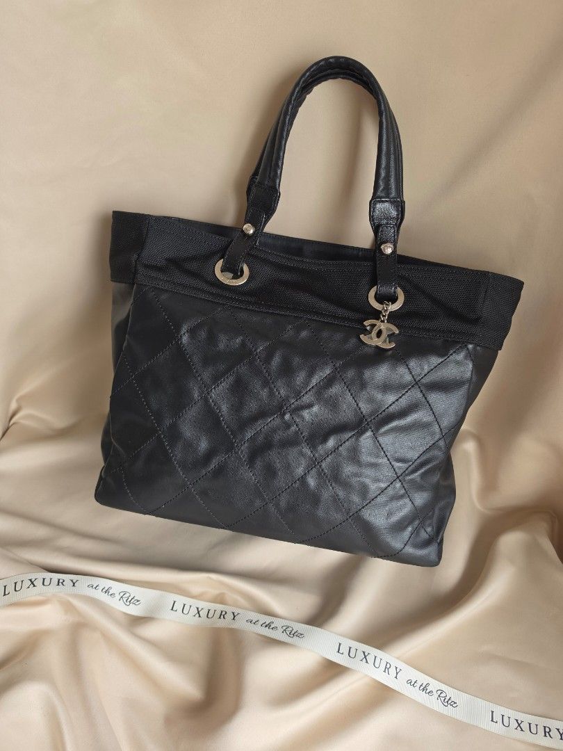 Chanel Tote (Category: Luxury Bags & Wallets) located in Makati City. Submitted by luxritz (Listing ID 1456066285, Image 1). Description: - Authentic black Chanel tote bag - Elegant quilted detailing - Comfortable leather handles - Iconic Chanel logo charm included - Crafted from a durable blend of leather and fabric and canvas - Ideal for everyday style and practicality Comes with sticker.