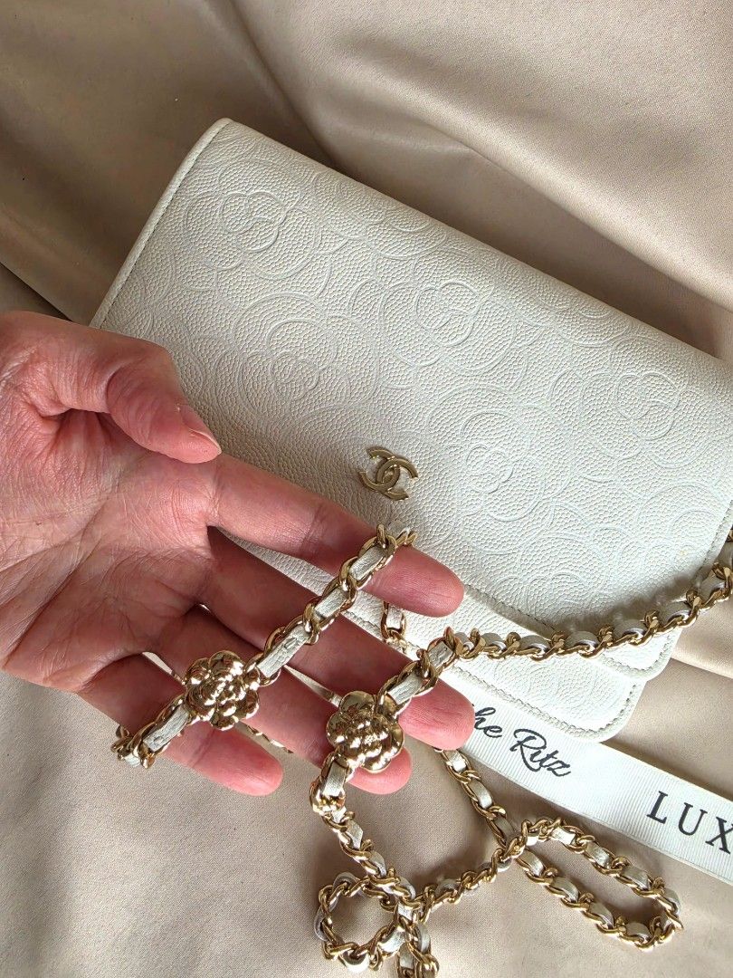 Chanel WOC (Category: Luxury Bags & Wallets) located in Makati City. Submitted by luxritz (Listing ID 1453910904, Image 3). Description: - Authentic Chanel Caviar WOC - Features embossed camellia pattern all over - Elegant gold hardware - Versatile leather and chain strap - Comes with full set (box, dustbag, authenticity card, etc.) - Brand new, unused condition.