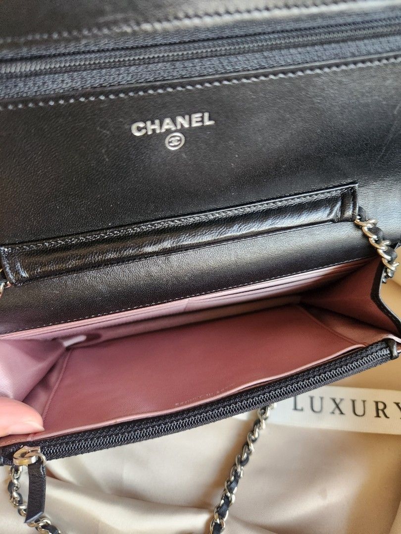 Chanel WOC (Category: Luxury Bags & Wallets) located in Makati City. Submitted by luxritz (Listing ID 1453910450, Image 2). Description: - Chanel WOC - Color: Black - Feature: Camellia embossing - Hardware: Silver - Includes: Original box, authenticity sticker - Ideal for: Carrying essentials - Price: PHP 85,000.