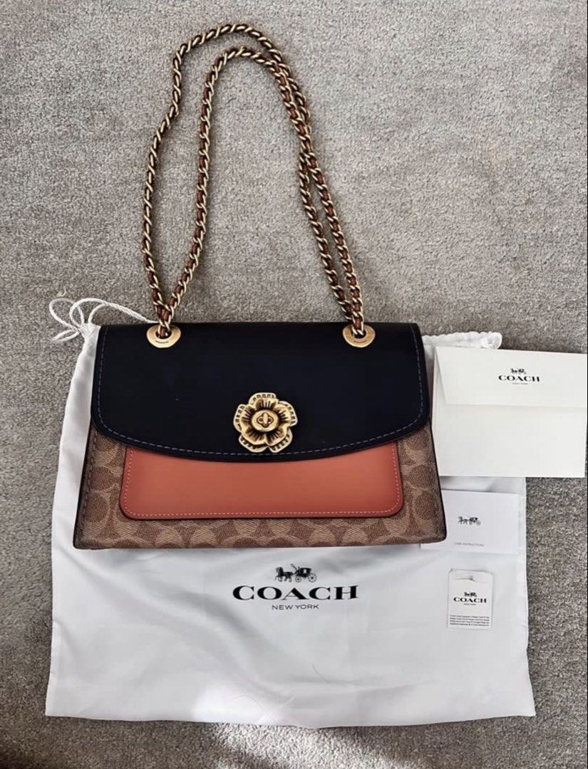Coach chain bag shoulder or crossbody (Category: Luxury Bags & Wallets) located in Makati City. Submitted by nmvs1 (Listing ID 1456152865, Image 3). Description: Coach chain strap shoulder or cross body bag Leather and coated canvass monogram cc logo with gold hardware Chain strap can be longer made into a body bag With dustbag Used once excellent condition No flaw to mention bought for 25k in Coach Rockwell.