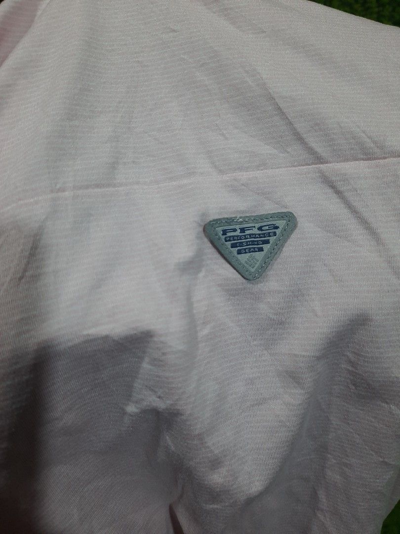 Columbia PFG Pink Hoodie Size Medium EUC (Category: Coats, Jackets and Outerwear) located in Baguio. Submitted by klayblakeb87803 (Listing ID 1456180374, Image 3). Description: - Light pink Columbia hoodie - Size: Medium - Kangaroo pocket - Drawstring hood - Blue accents on zipper placket and inside hood - PFG logo on sleeve - Ideal for outdoor activities and casual wear.