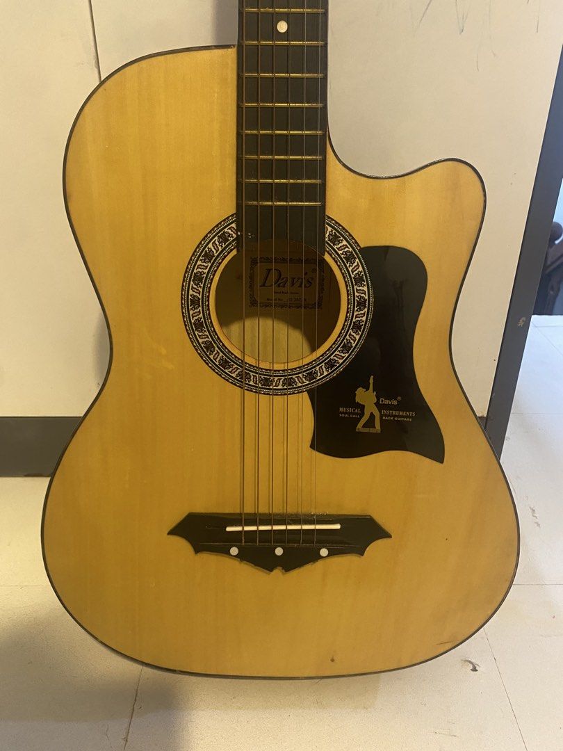 Davis Acoustic Guitar (Category: Musical Instruments) located in Cavite. Submitted by laliswagg (Listing ID 1456110649, Image 2). Description: - Davis acoustic guitar - Natural wood finish - Cutaway body for easier access - Ideal for beginners or casual players - No Issue. Almost like new - Ready for its new owner - Feel free to ask any questions!.