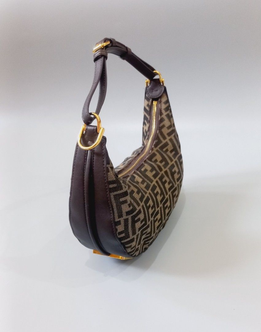 Fendi Monogram Canvas & Leather Hobo Bag (Category: Luxury Bags & Wallets) located in Cebu City. Submitted by MrLiks_123 (Listing ID 1456184553, Image 3). Description: Classic Fendi hobo bag Authenticity not guaranteed - Iconic FF monogram canvas - Brown leather trim and strap - Gold hardware with FENDI logo detail - Zipper closure - Stylish everyday bag.