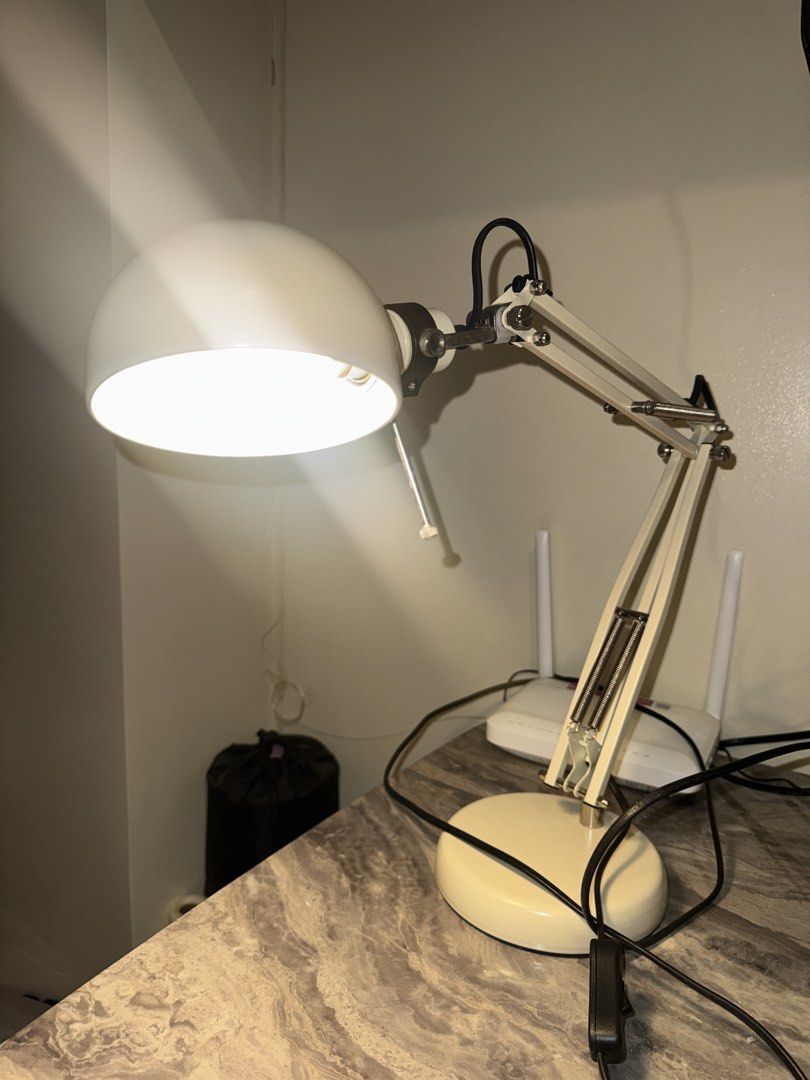 Forsa Work Lamp - Beige/Cream (Category: Lighting) located in Quezon City. Submitted by mikarchives (Listing ID 1456153517, Image 3). Description: - Beige/Cream colored adjustable desk lamp - Flexible arm and head for easy positioning - Comes with a bulb (warm light) - No issues - No box - Available for grab / lalamove delivery only.