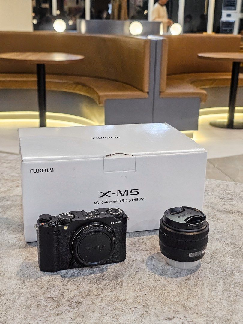 Fujifilm XM5 + 15-45mm (Category: Cameras) located in Baguio. Submitted by aeralecamerastore (Listing ID 1456161963, Image 1). Description: Fujifilm XM5 + 15-45mm P 52500 Location : Baguio / Makati / Cubao / BGC No issues Good as new No dents / scratches Shutter Count - 6K only Actual Photos Posted Open For Cash on delivery / COP LBC Inclusions: What’s Included? Fujifilm XM5 + 15-45 Original Box Receipt Strap Camera Bag.
