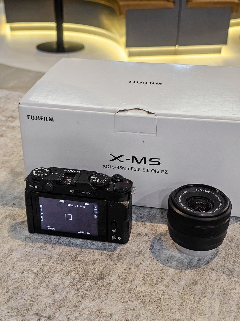 Fujifilm XM5 + 15-45mm (Category: Cameras) located in Baguio. Submitted by aeralecamerastore (Listing ID 1456161963, Image 3). Description: Fujifilm XM5 + 15-45mm P 52500 Location : Baguio / Makati / Cubao / BGC No issues Good as new No dents / scratches Shutter Count - 6K only Actual Photos Posted Open For Cash on delivery / COP LBC Inclusions: What’s Included? Fujifilm XM5 + 15-45 Original Box Receipt Strap Camera Bag.